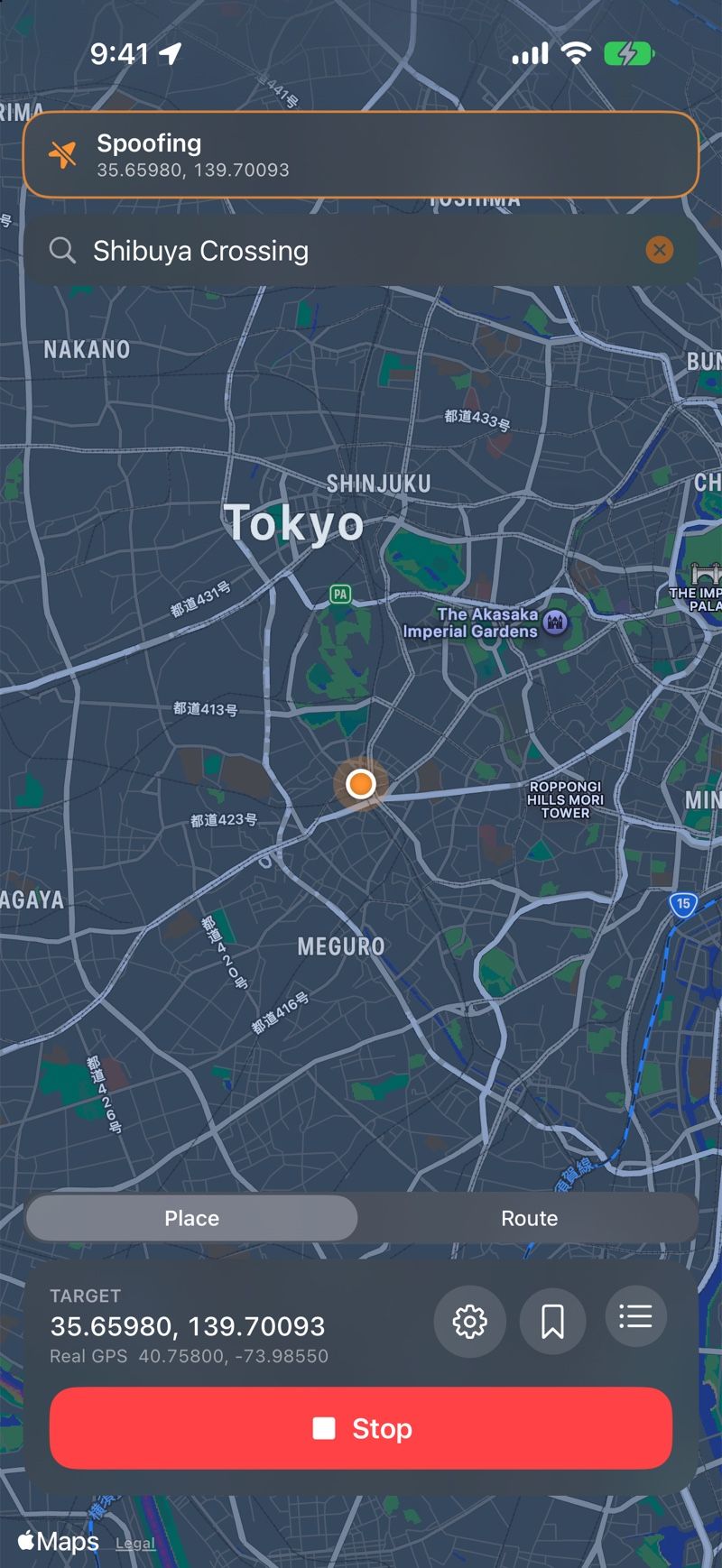Elsewhere spoofing in Tokyo, with an orange banner showing the new coordinates and a red Stop button